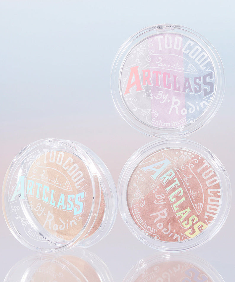 TOO COOL FOR SCHOOL Art Class By Rodin Highlighter compact set with three shades displayed on a reflective surface