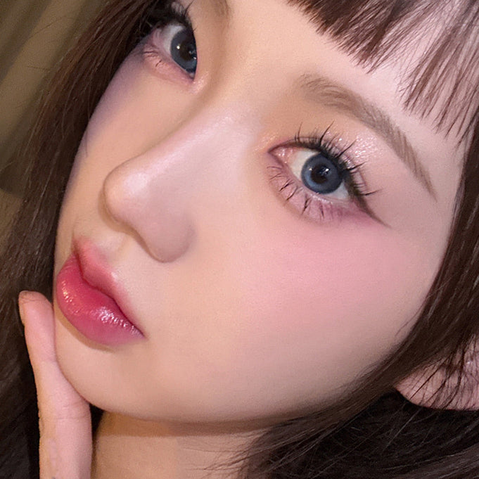 Close-up of a model showcasing makeup using TOO COOL FOR SCHOOL Art Class Smudging Team Liner