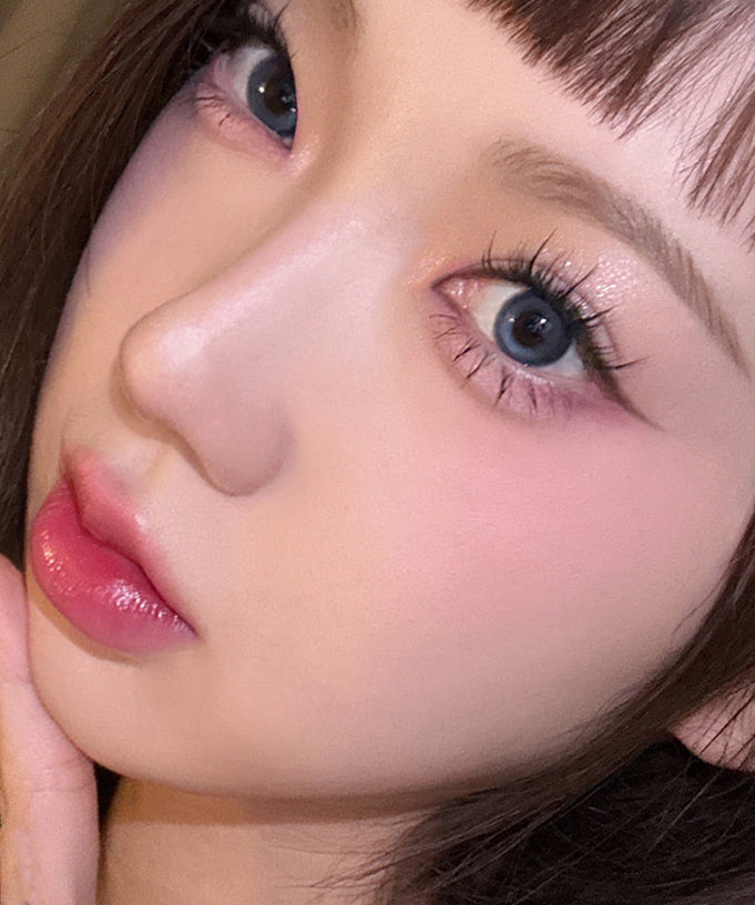 Close-up of a model showcasing makeup using TOO COOL FOR SCHOOL Art Class Smudging Team Liner