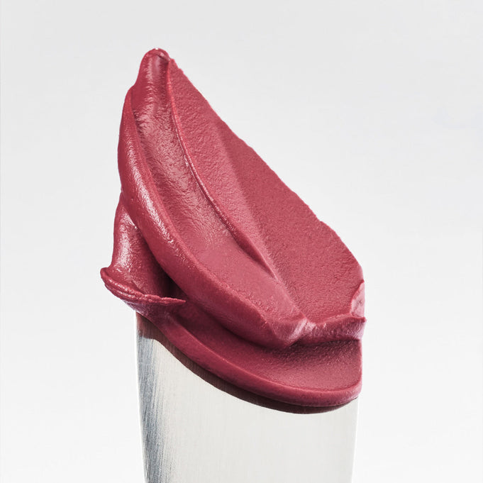 Close-up of TOO COOL FOR SCHOOL Sway Lip Velvet in vibrant red shade, showcasing smooth, velvety texture on applicator.