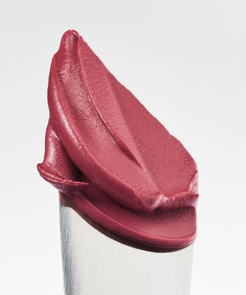 Close-up of TOO COOL FOR SCHOOL Sway Lip Velvet in vibrant red shade, showcasing smooth, velvety texture on applicator.