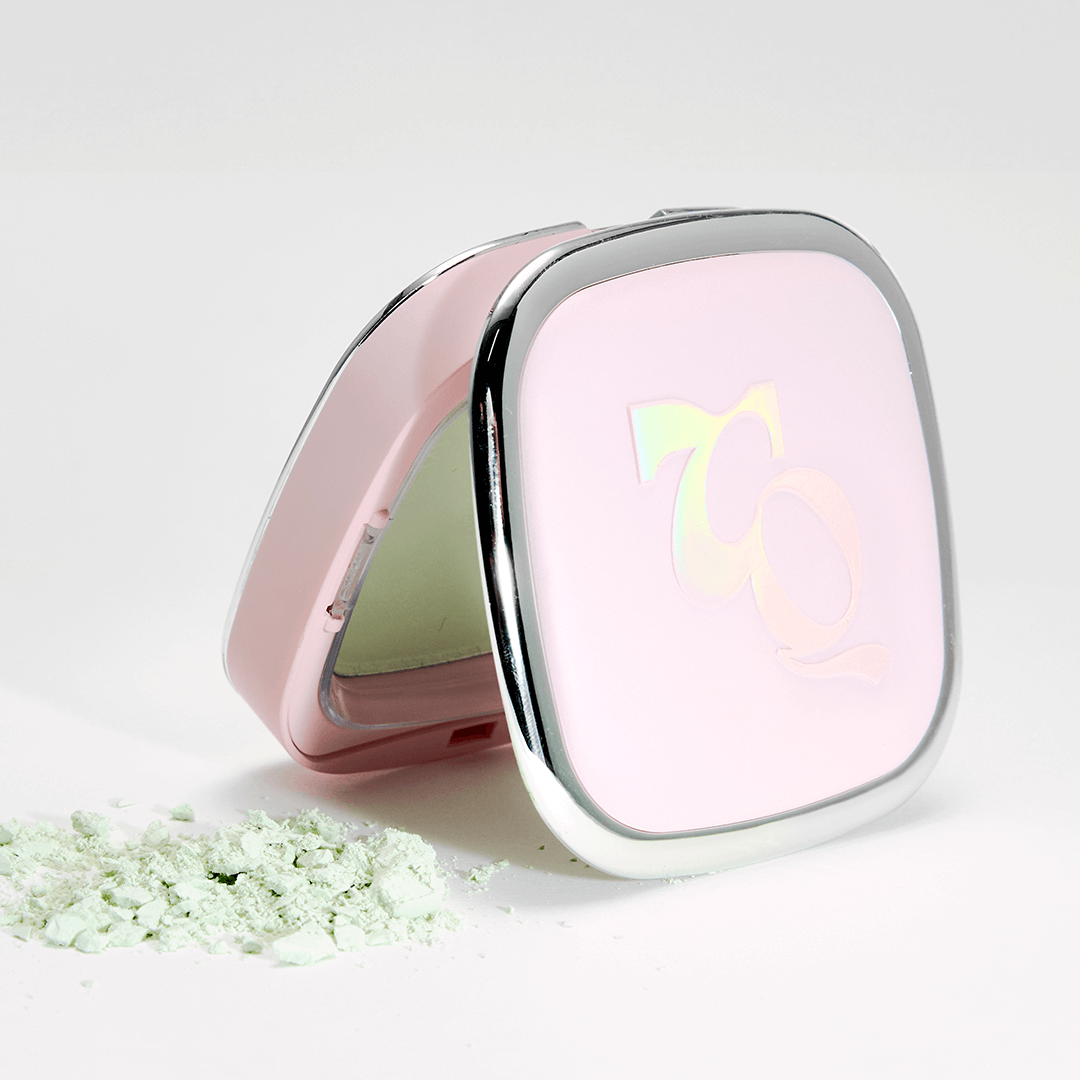 TOOQ Water Color Petal Powder in compact case with scattered green powder