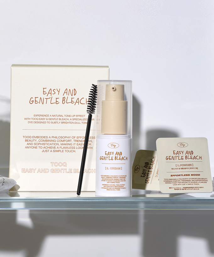 TOOQ Easy And Gentle Bleach displayed with applicator and product packaging.