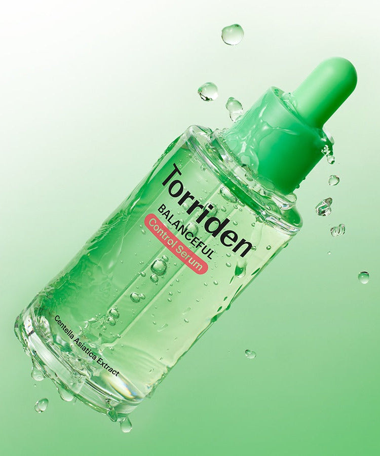 TORRIDEN Balanced Cica Control Serum 50ml product image with green background and droplets showcasing texture.