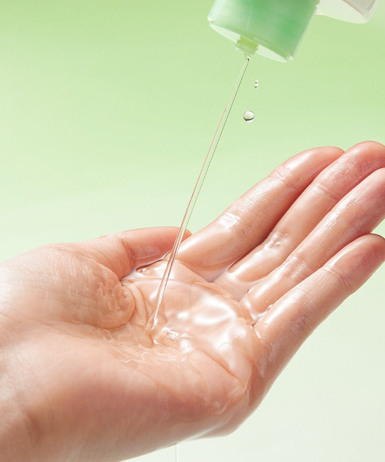 Pouring TORRIDEN Balanceful Peeling Toner 250ml into hand