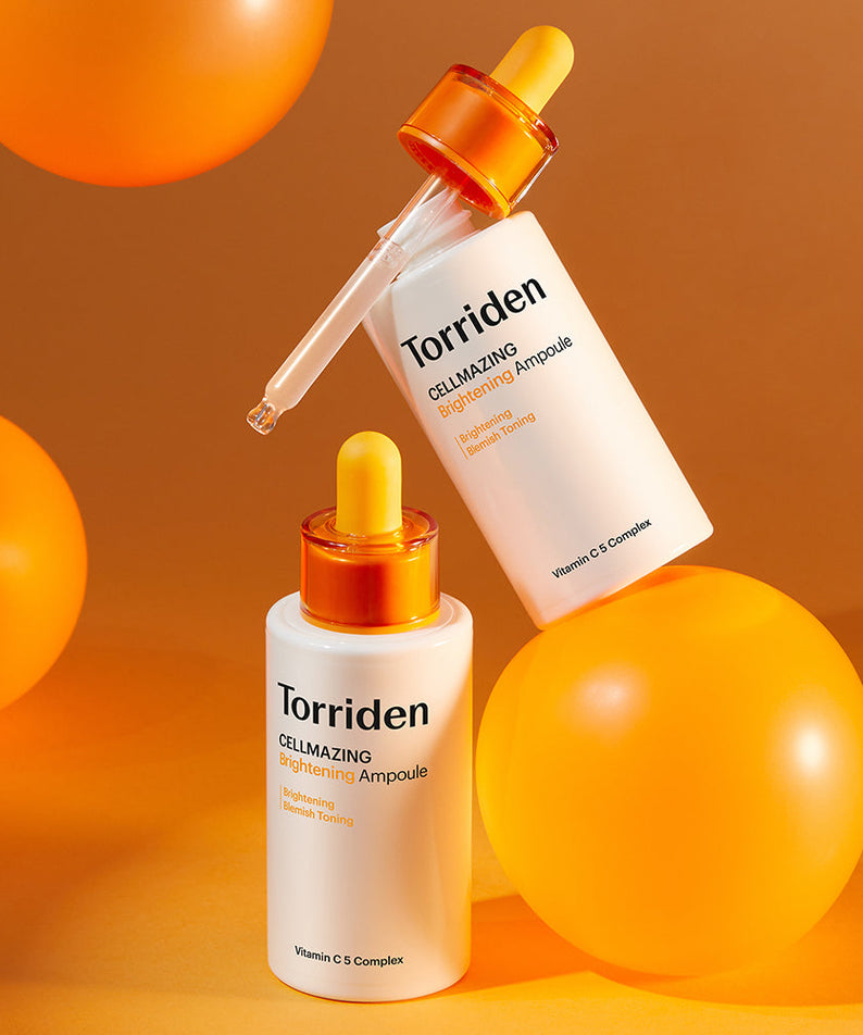 TORRIDEN Cellmazing Vitamin C5 Complex Brightening Ampoule 30ml bottles displayed with orange background and spheres