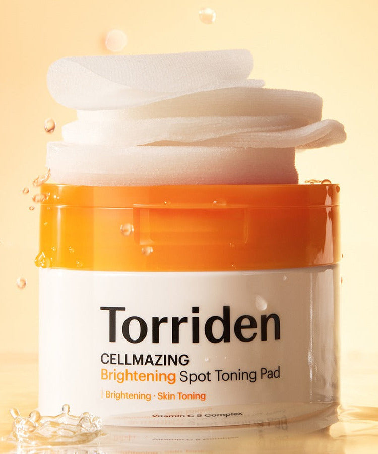 TORRIDEN Cellmizing Vita C brightening Trace Toning Pads 70 sheets, skincare product in orange and white container with stacked pads.