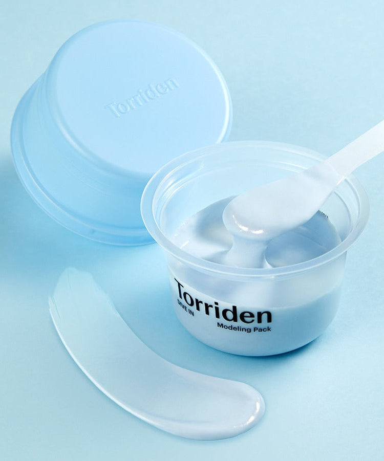 TORRIDEN Dive In Low olecular Hyaluronic Acid Modeling Pack with spoon, open container, and product sample on light blue background