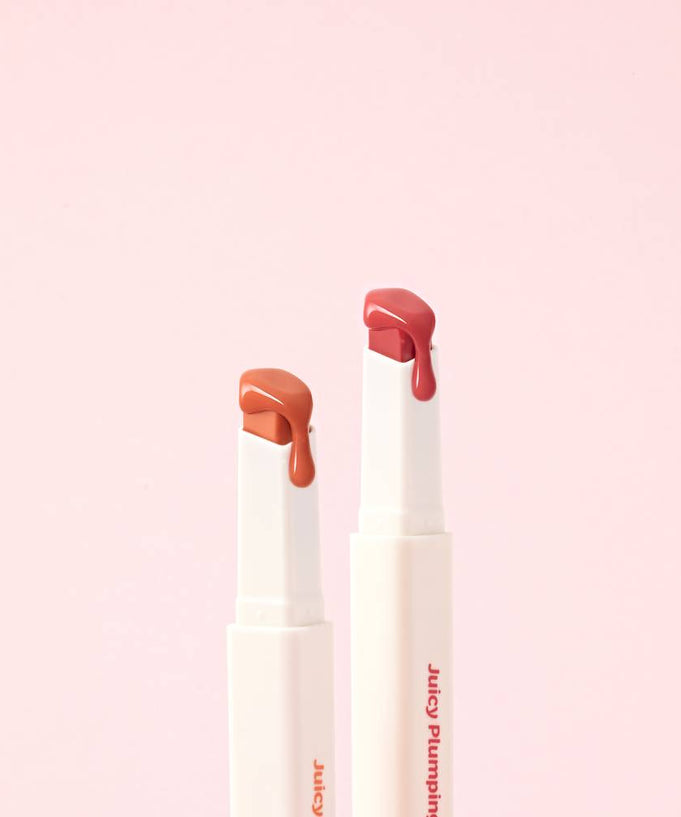 TOUCH IN SOL Vegan Again Juicy Plumping Lipstick in two shades against a pink background