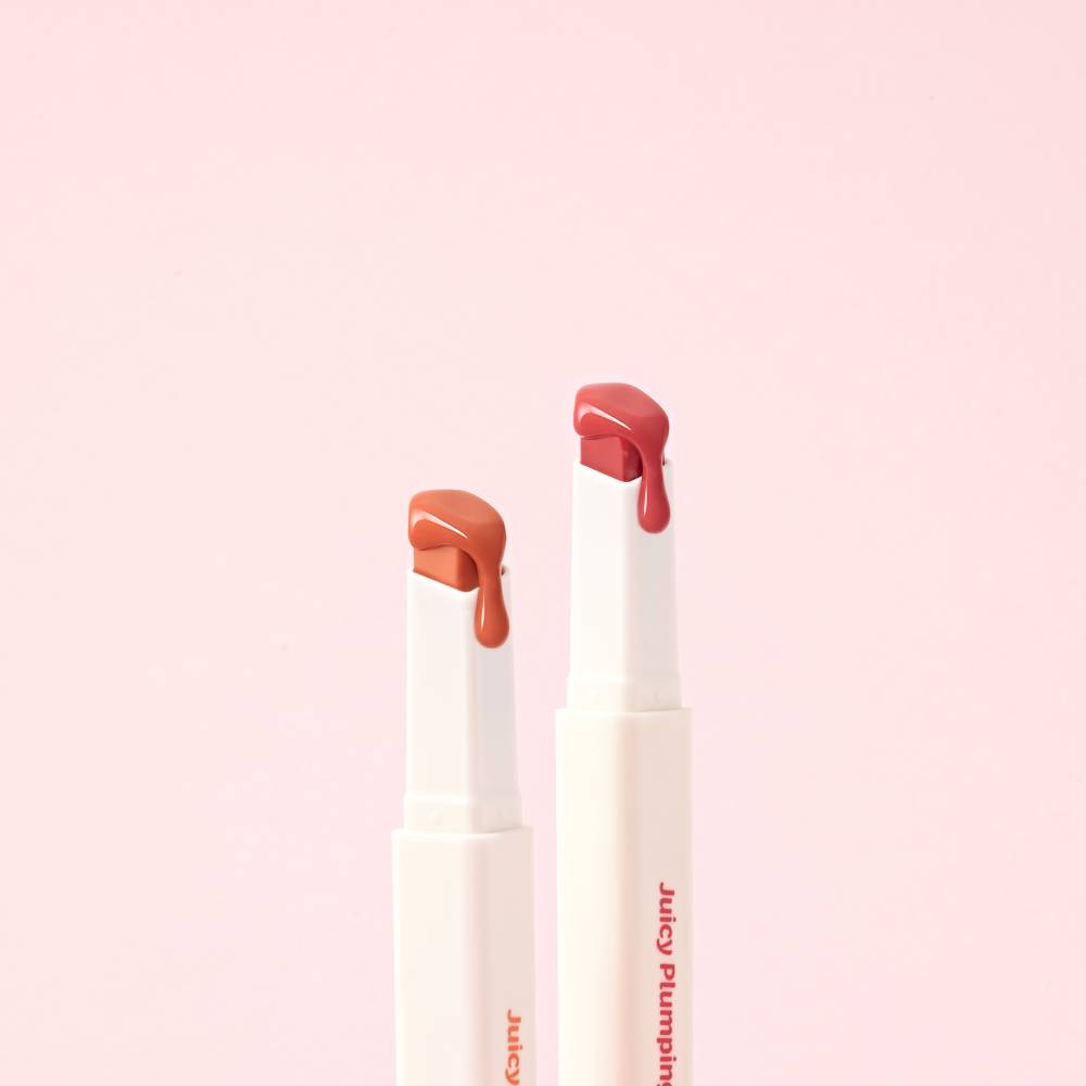 TOUCH IN SOL Vegan Again Juicy Plumping Lipstick in two shades against a pink background