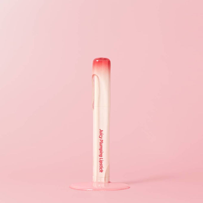 TOUCH IN SOL Vegan Again Juicy Plumping Lipstick on a pink background