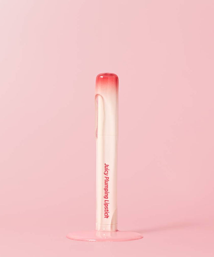 TOUCH IN SOL Vegan Again Juicy Plumping Lipstick on a pink background