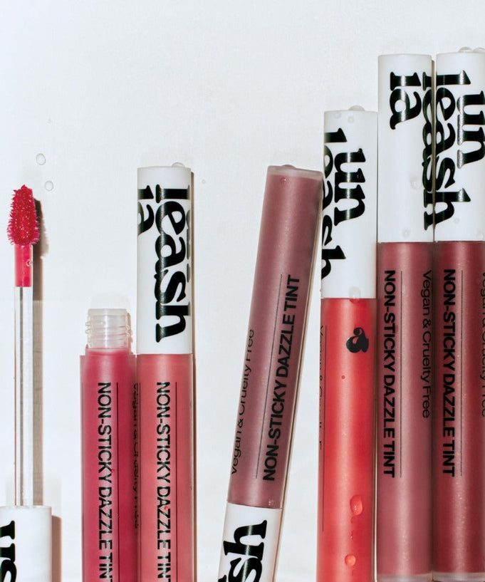 UNLEASHIA Non-Sticky Dazzle Tint in multiple shades, showcasing vibrant lip color options with vegan and cruelty-free formula.