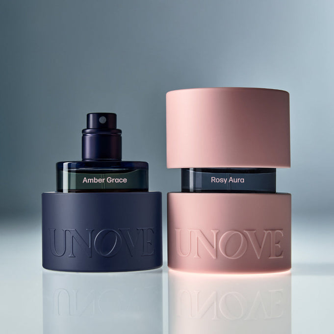 UNOVE Eau De Parfume bottles featuring Amber Grace and Rosy Aura fragrances with elegant packaging.