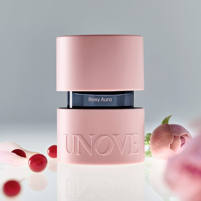UNOVE Eau De Parfume bottle showcased with floral accents, highlighting elegance and style.