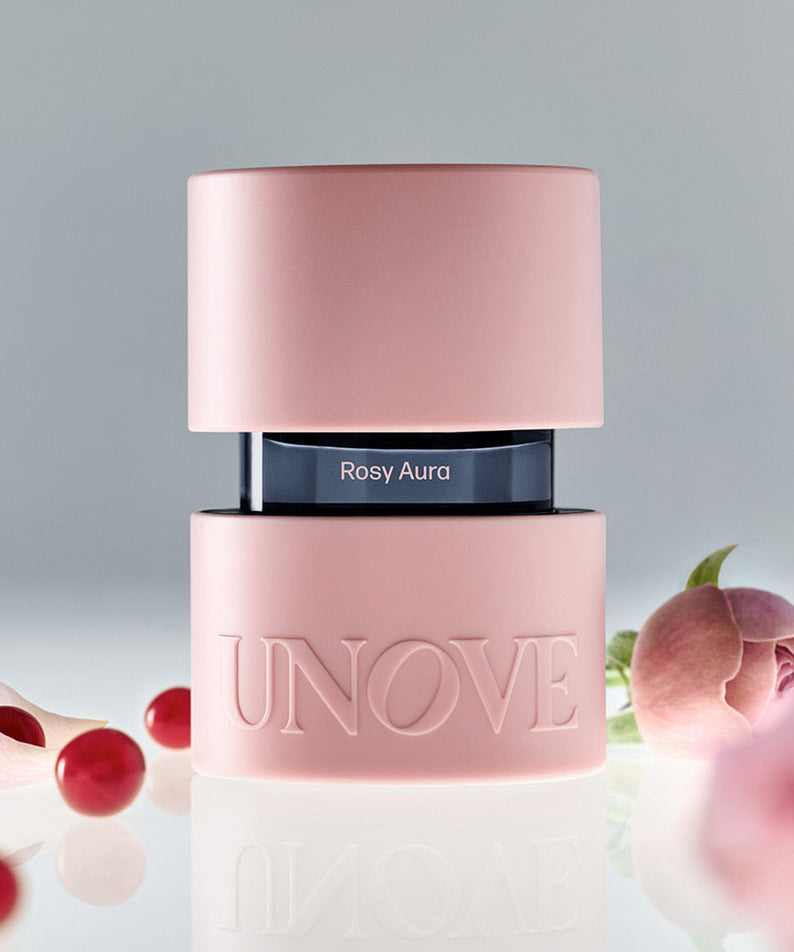UNOVE Eau De Parfume bottle showcased with floral accents, highlighting elegance and style.