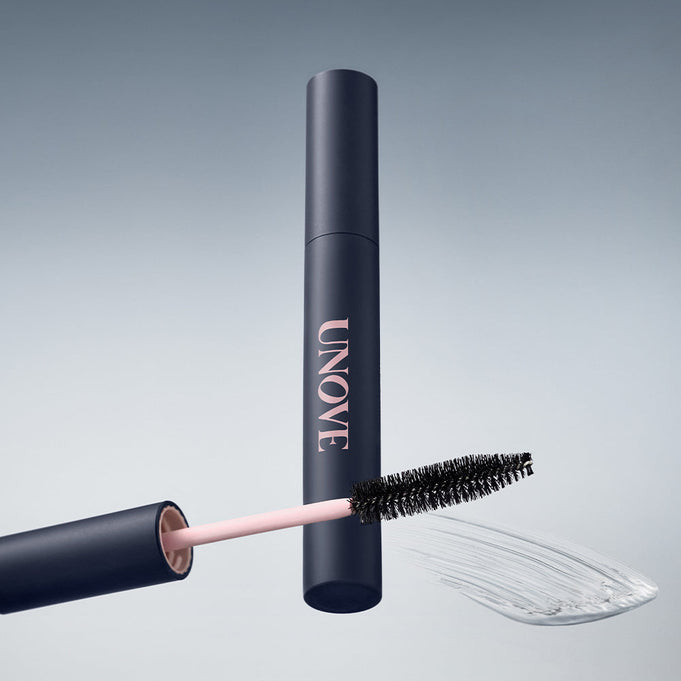 UNOVE Frizz Calming Slick Hair Finishing Stick 10ml shown with applicator and product texture.