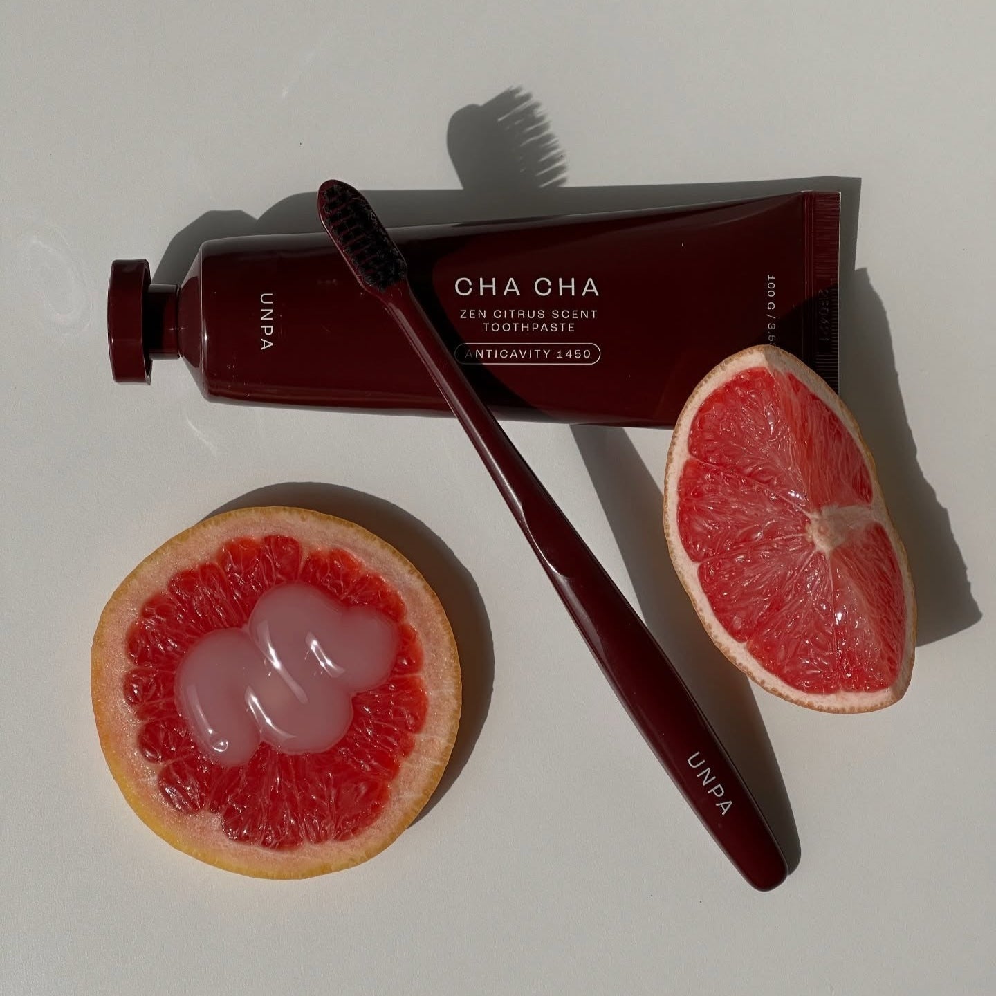 UNPA Cha Cha Zen Grapfruit Scent 1450 High Fluoride Toothpaste 100g with grapefruit and toothbrush