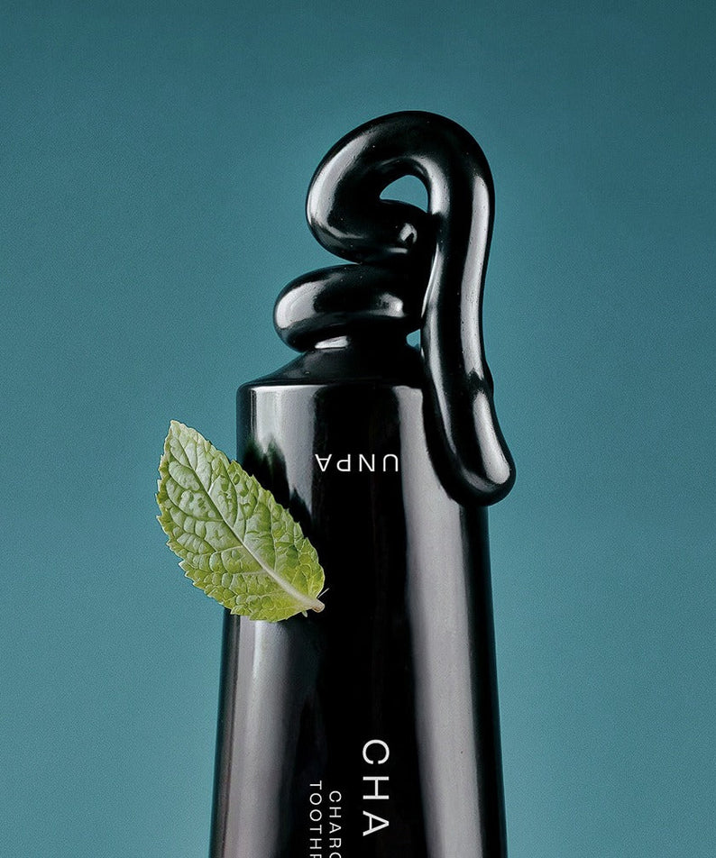 UNPA Cha Cha Charcoal Original Toothpaste 100g with black paste and mint leaf for fresh oral care