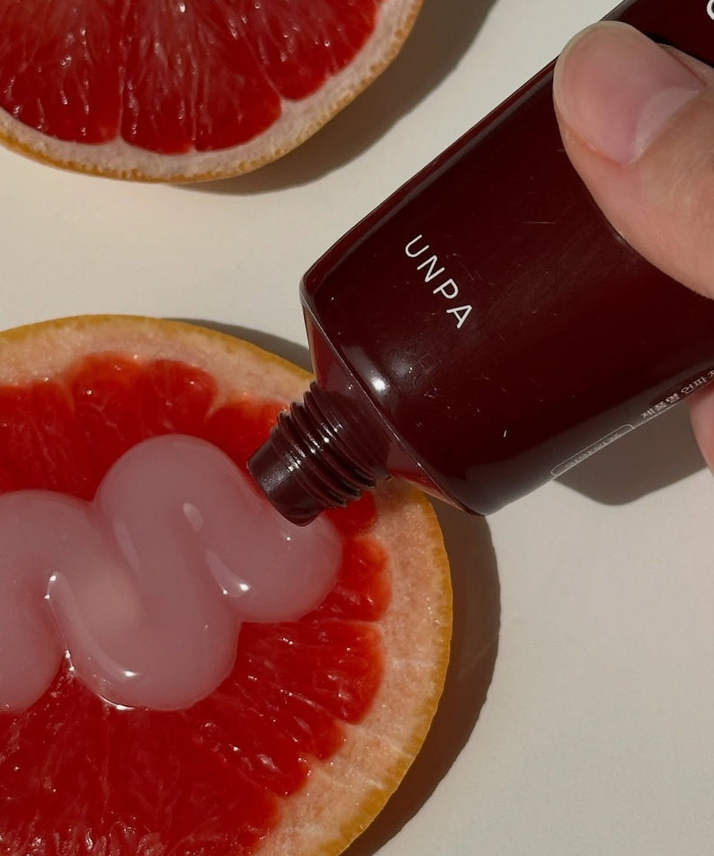 UNPA Cha Cha Zen Grapfruit Scent 1450 High Fluoride Toothpaste 100g on sliced grapefruit