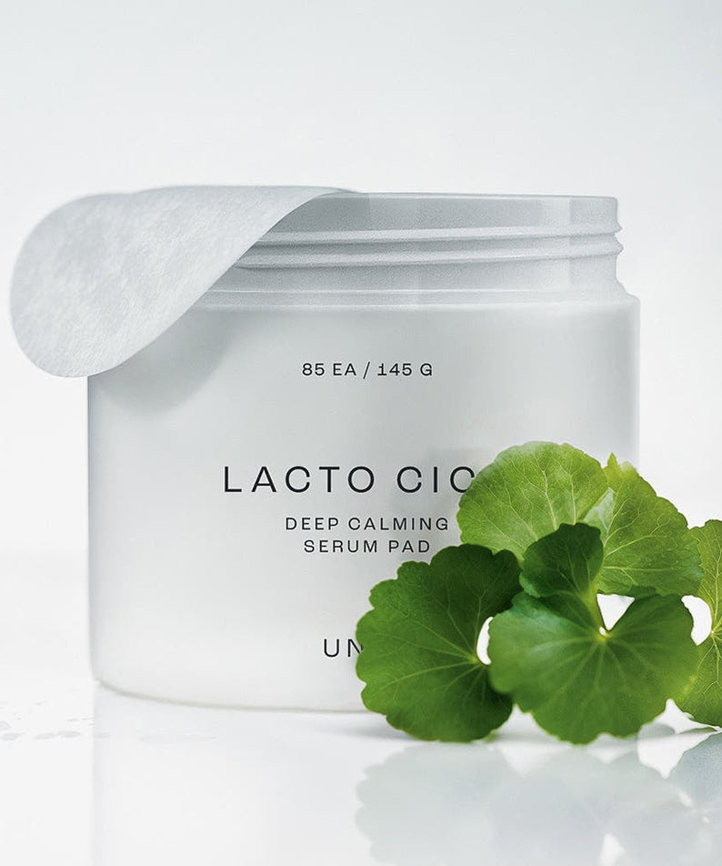 UNPA Lacto Cica Deep Calming Serum Pad 85 Sheets in white container with green leaves, skincare product for soothing skin.