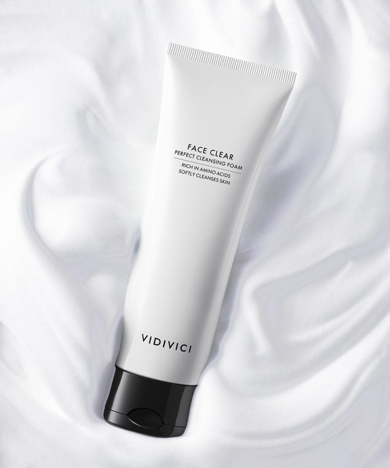 Image of VIDIVICI Face Clear Perfect Cleansing Foam 120ml, showcasing sleek packaging on a creamy background for effective cleansing.