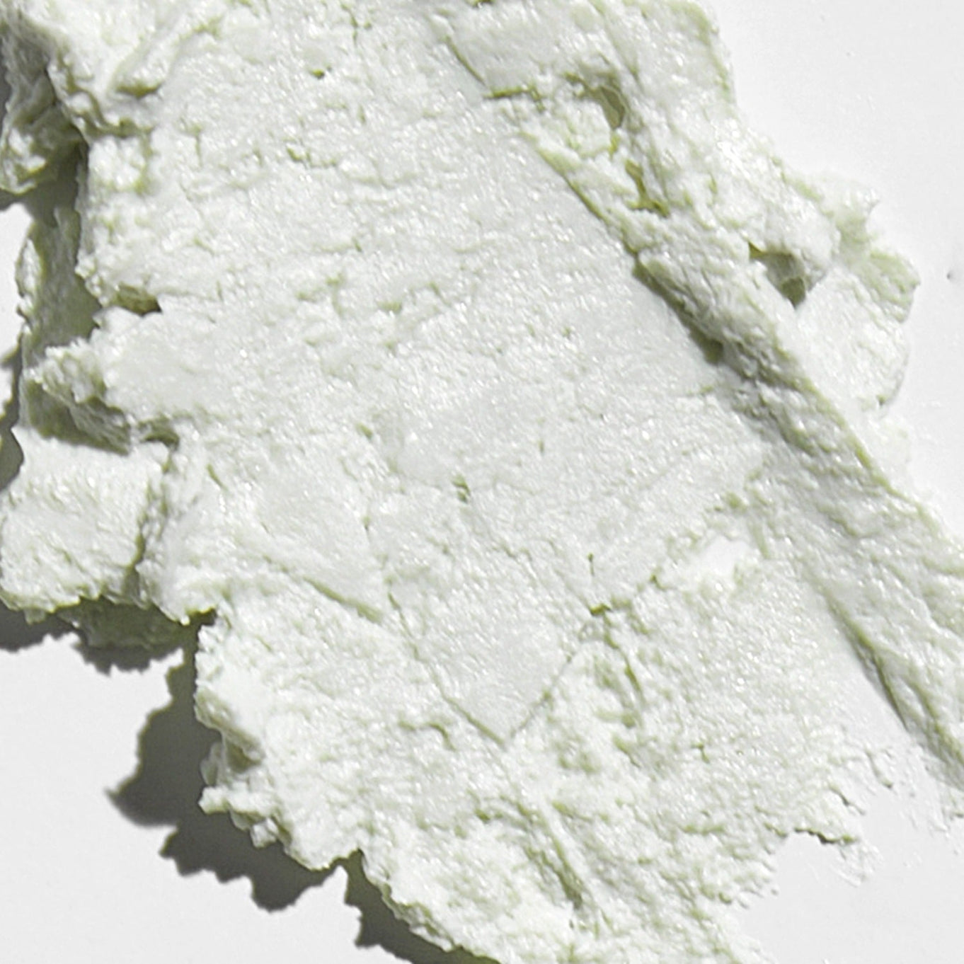 Close-up of VT COSMETIC PDRN Essennce Glow Sun Pact 10g showcasing texture and color.