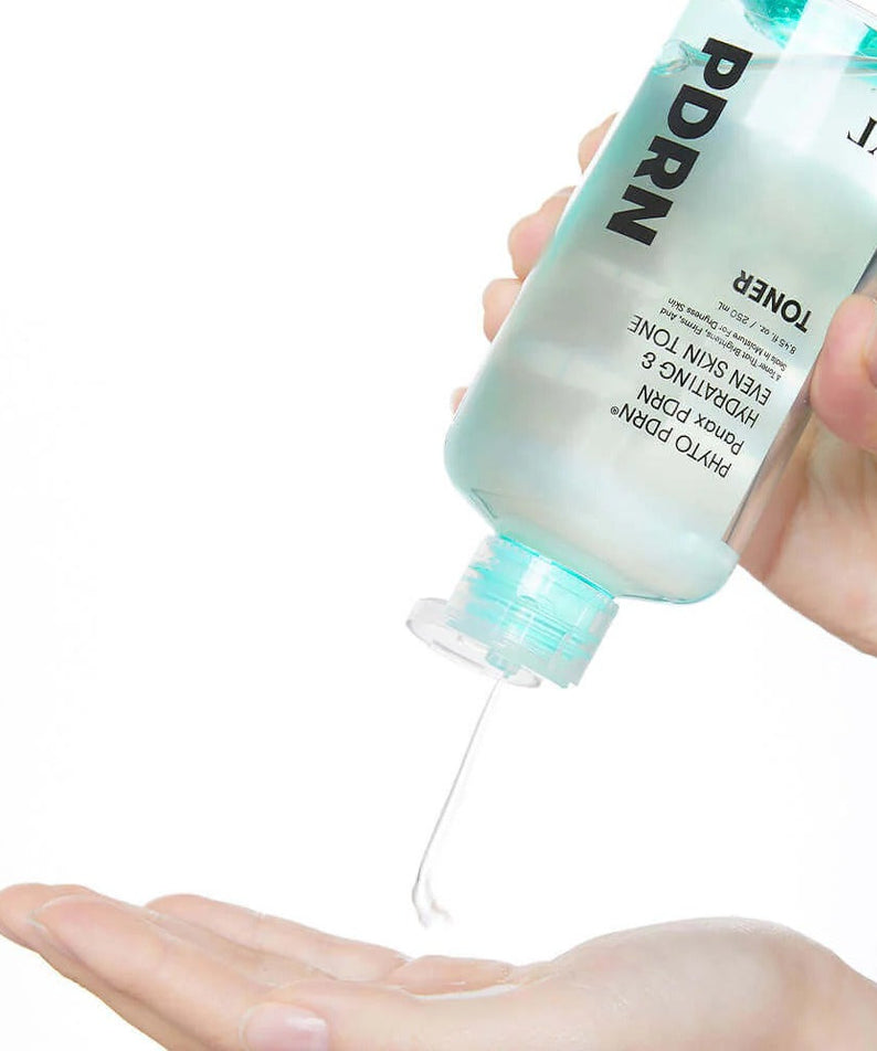 VT COSMETIC PDRN Toner 250ml being poured into hand for skincare routine.