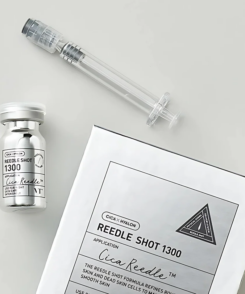 VT COSMETIC Riddle Shot 1300 8ml skincare product with packaging, syringe, and vial displayed on a neutral background