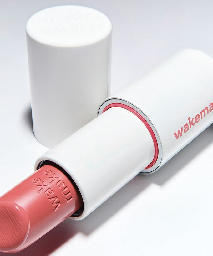 WAKEMAKE Healthy Glow Balm Sticks in pink shade with open cap showcasing the creamy texture.
