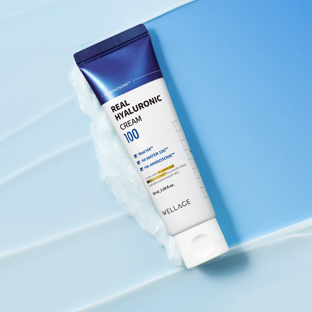 WELLAGE Real Hyaluronic 100 Cream 80ml on a blue background showcasing packaging design