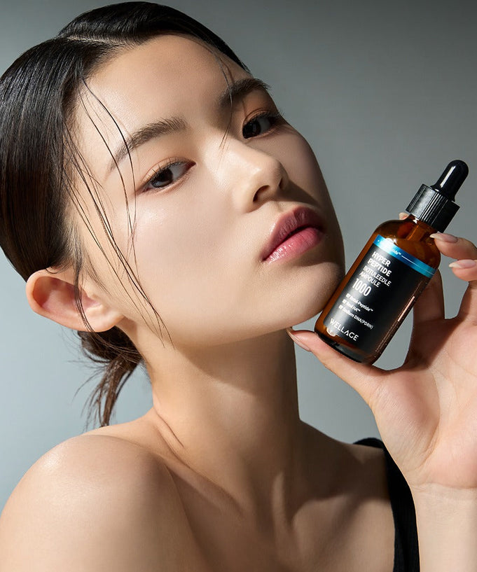 Model holding WELLAGE Hyper Peptide Botulinum Ampoule 50ml, showcasing skincare product benefits.