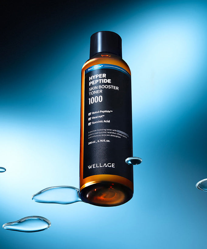 Bottle of WELLAGE Hyper eptide Skin booster Toner 200ml with water droplets on a blue background