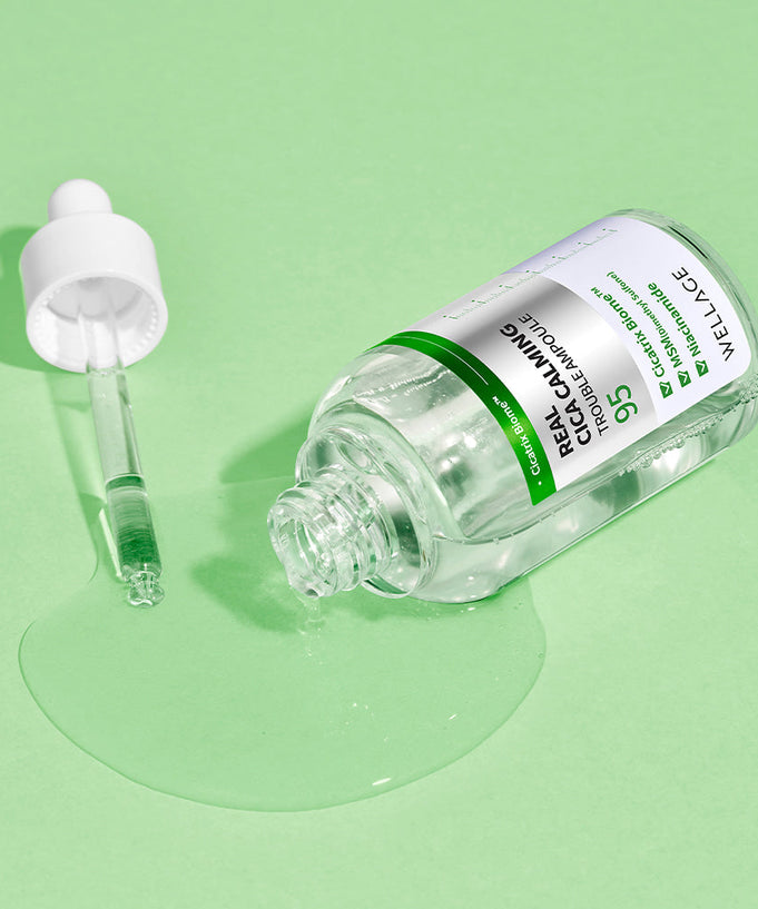 WELLAGE Real Cica Calming 95 Trouble Ampoule 50ml with dropper on green background