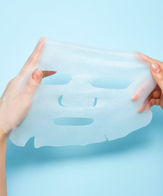 WELLAGE Real Hyaluronic Blue Ampoule Mask 5 Sheets being held against a blue background.