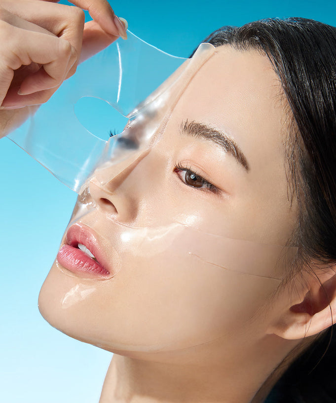 Woman applying WELLAGE Real hyaluronic Glow Booster PDRN Mask 5 Sheets