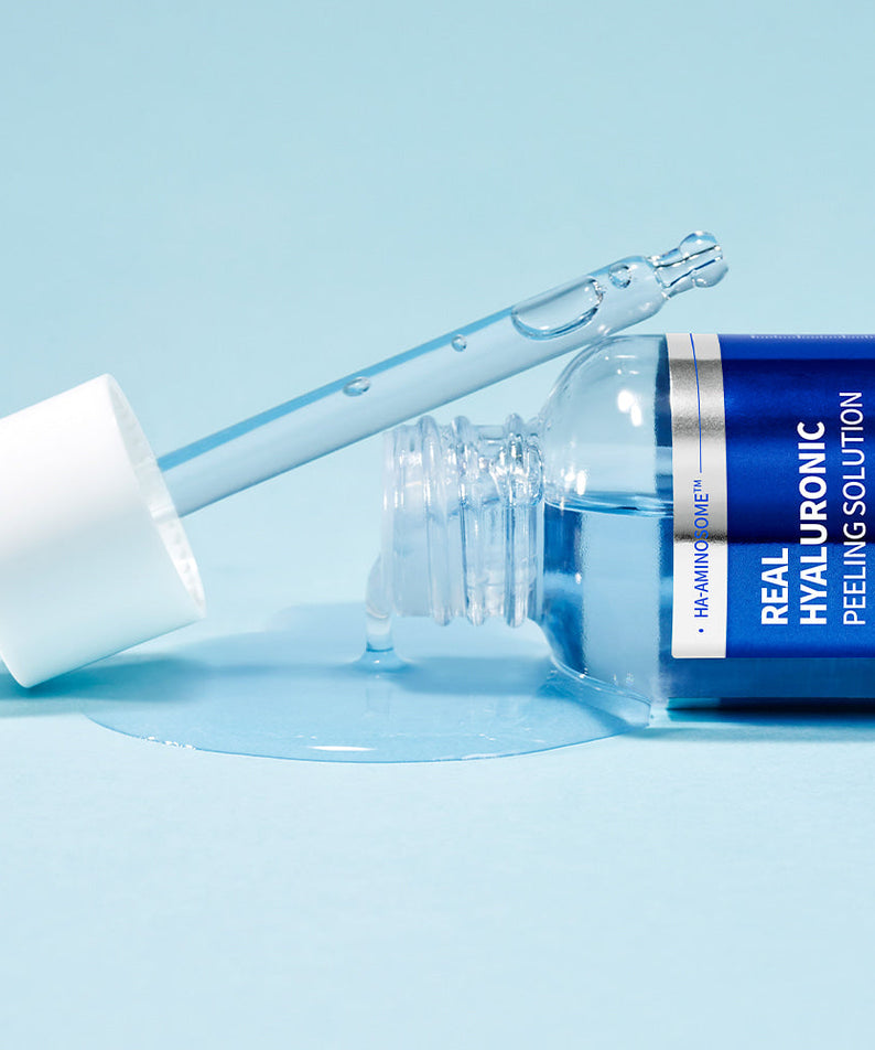 WELLAGE Real Hyaluronic Peeling Solution 30ml bottle with dropper on a blue background, showcasing skincare product details.