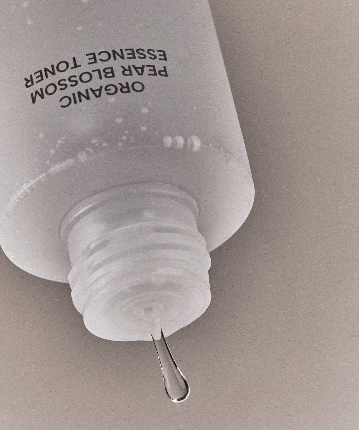 WHAMISA Organic Pear Blossom Fermented Essence Toner 160ml bottle with liquid drop