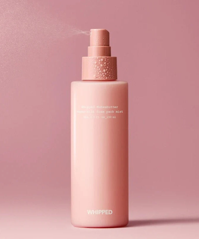 WHIPPED Butter Vegan Milk Foam Pack Mist 150ml in pink spray bottle on pink background