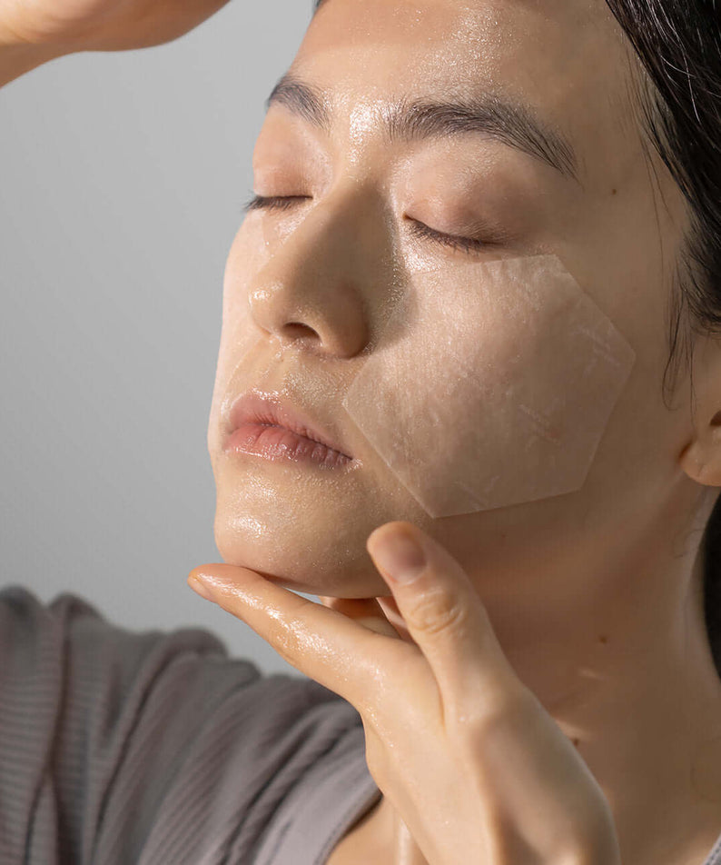 Woman applying XOUL Extreme Frozen Mask 10g to her face