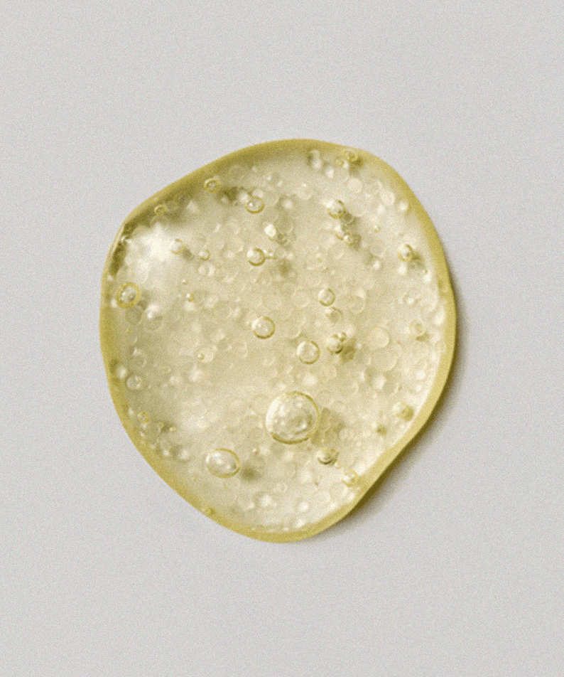 Texture of XOUL Micro Derma Booster 30ml serum showing gel-like consistency with bubbles