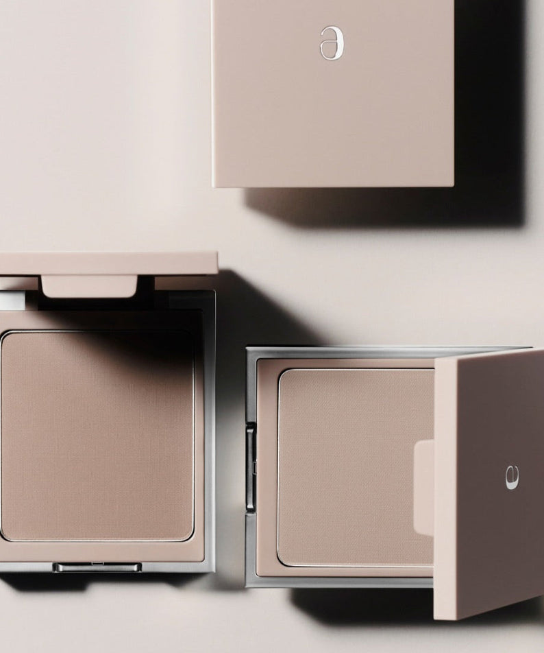 AMELI Maroon Shading makeup compacts featuring elegant design in neutral tones.