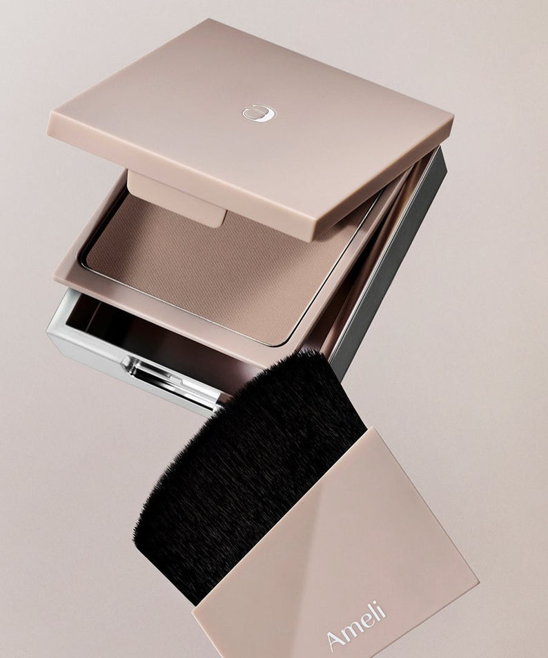 AMELI Maroon Shading compact with brush, elegant design, perfect for makeup enthusiasts.