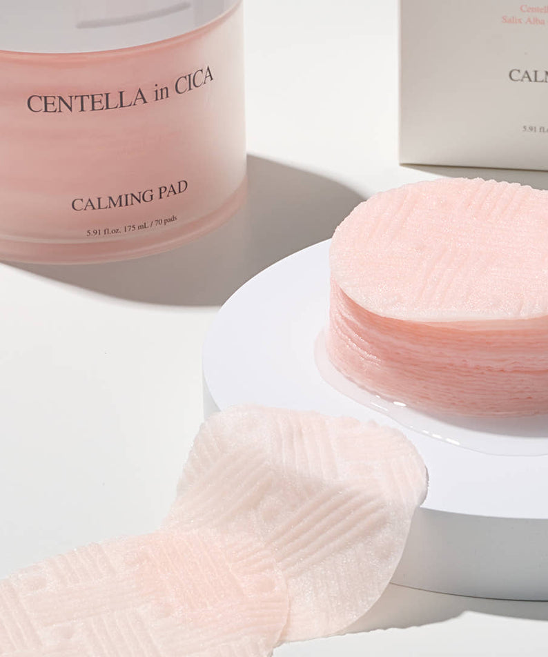 AND:AR Centellian in Cica Calming Pads 70 sheets displayed on a table, highlighting their gentle and soothing design.