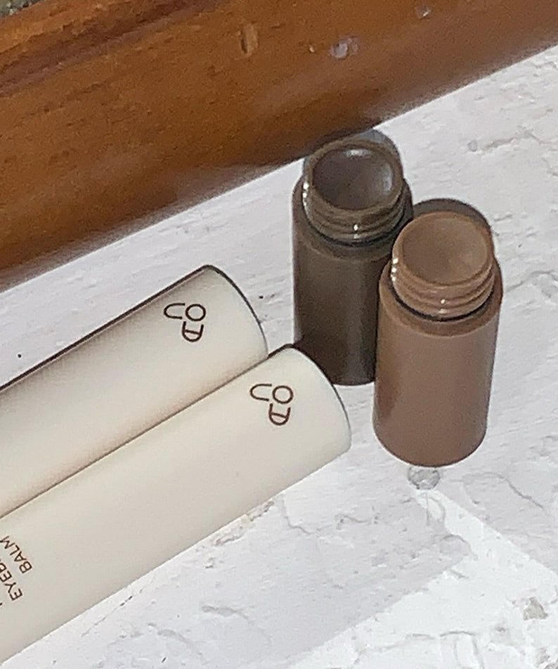 AOU Pinpoint Eyebrow Balm displayed on a white surface