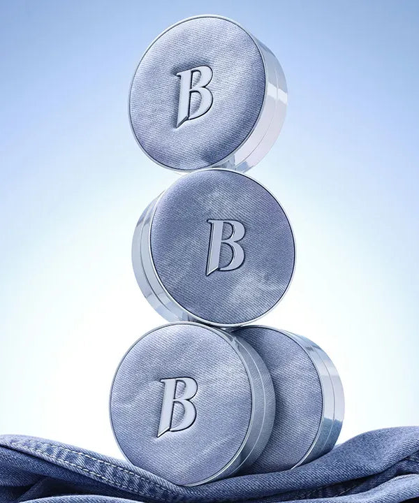 Stacked BANILACO Covericious Ultimate White Cushion compacts on blue backdrop