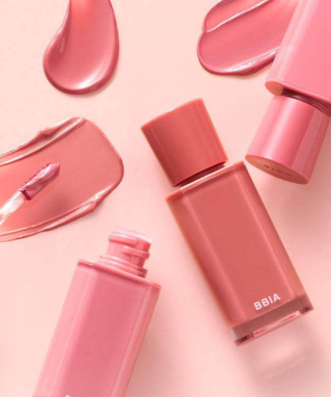 BBIA Glow Tint - various shades of BBIA Glow Tint bottles and swatches on a soft background. Enhance your lip color and shine.