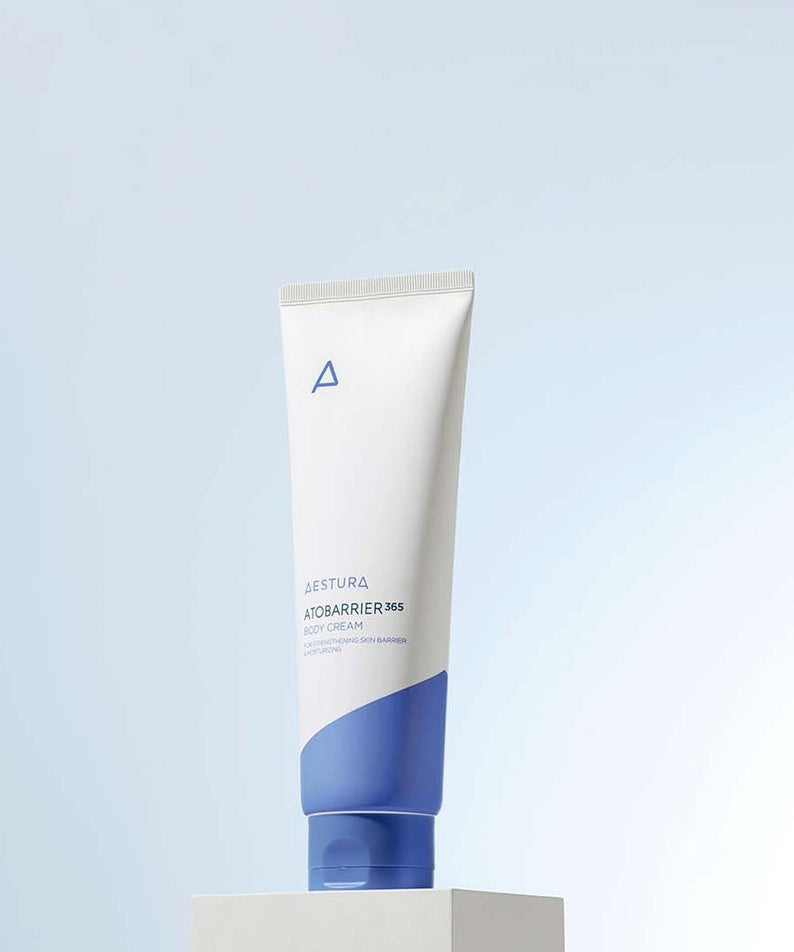 AESTURA Atobarrier 365 Body Cream 250ml product image showcasing sleek blue and white packaging on a minimalistic background.