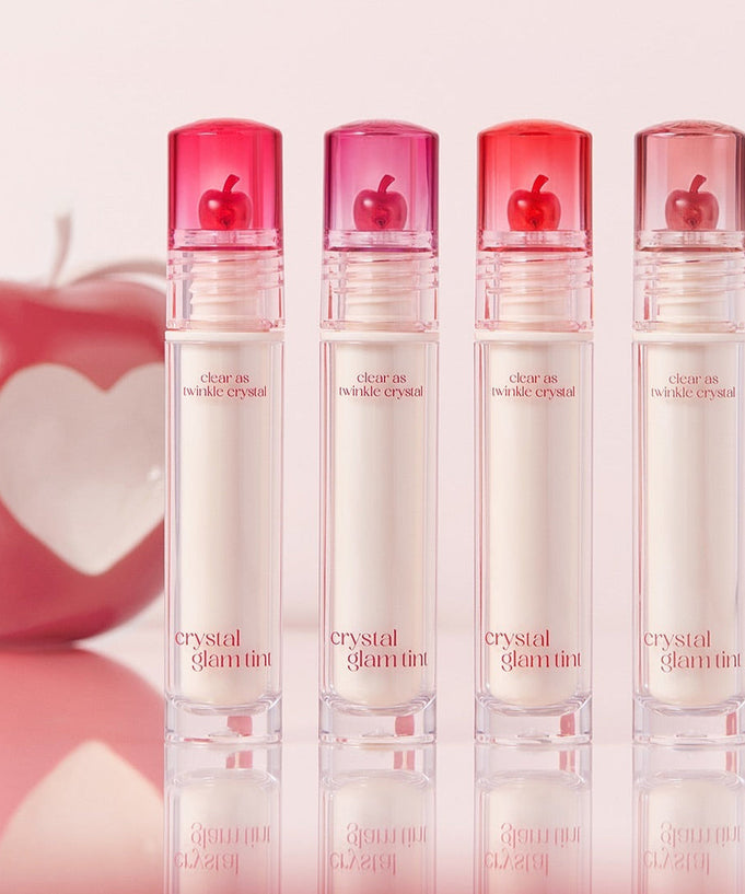 CLIO Crystal Glam Tint lip gloss collection with vibrant shades and elegant packaging