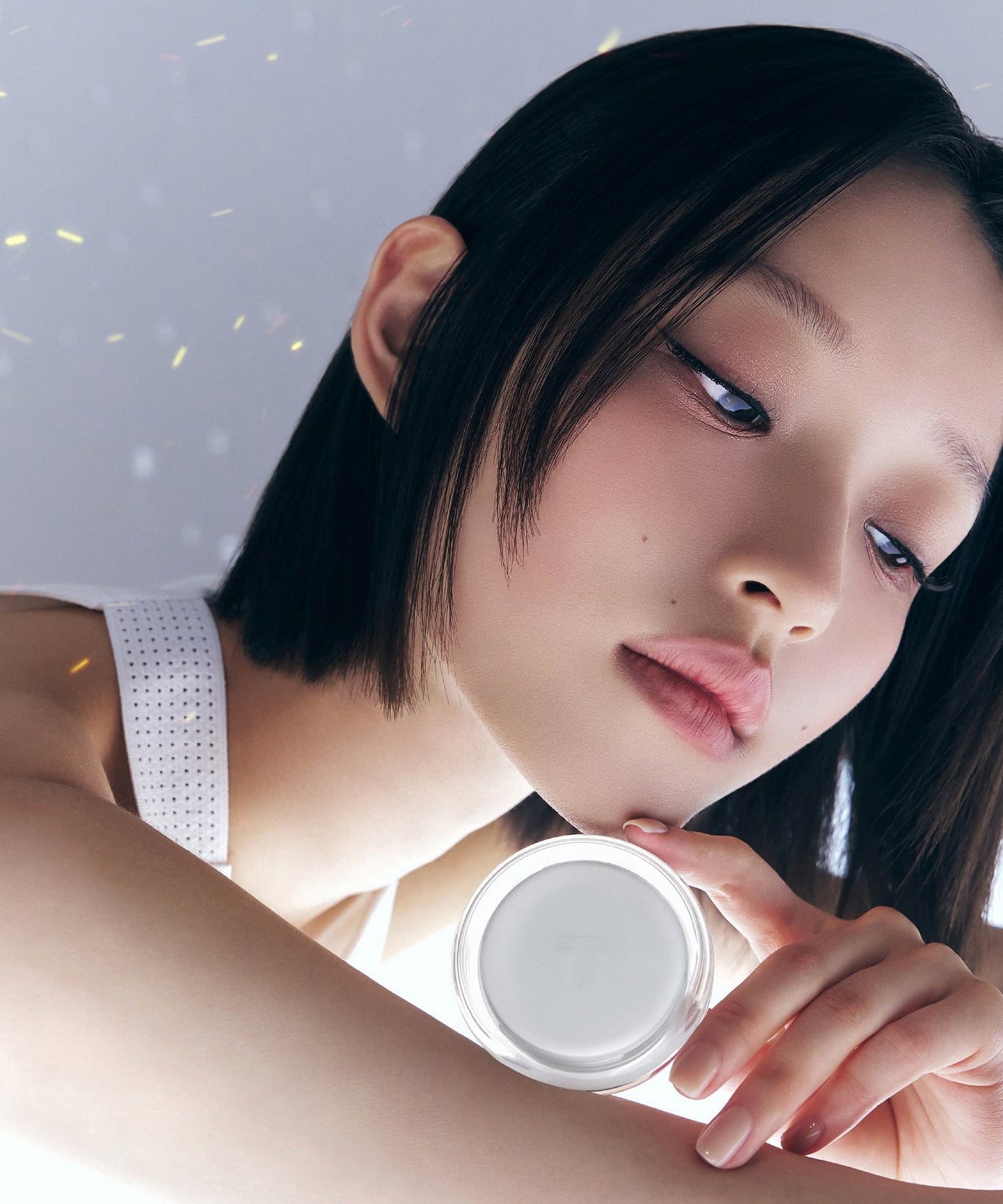 Person holding TENSE Hybrid Makeup Saver in a reflective pose